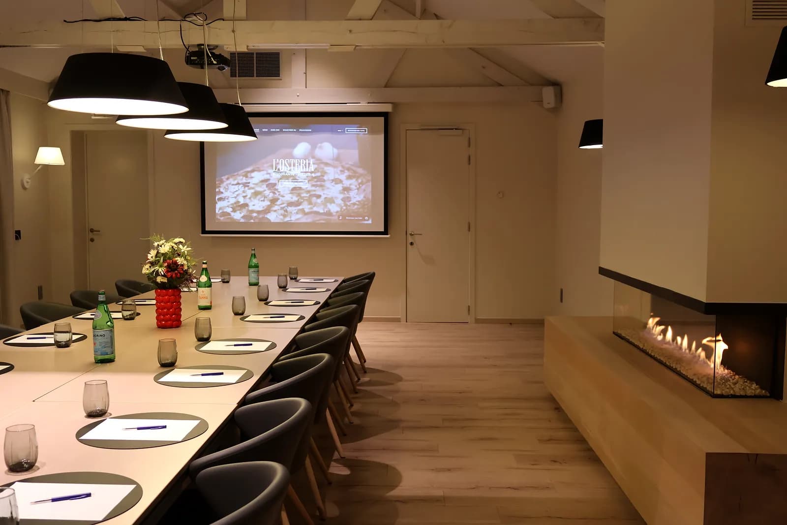 View of the projection screen and the gas fireplace