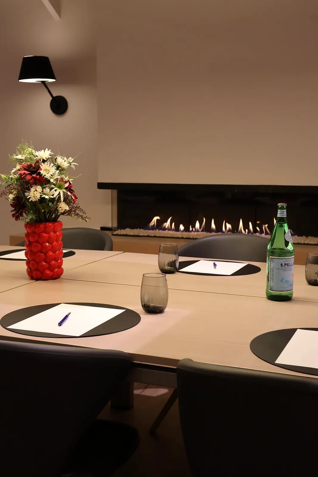 Detail of the meeting table by the fireplace